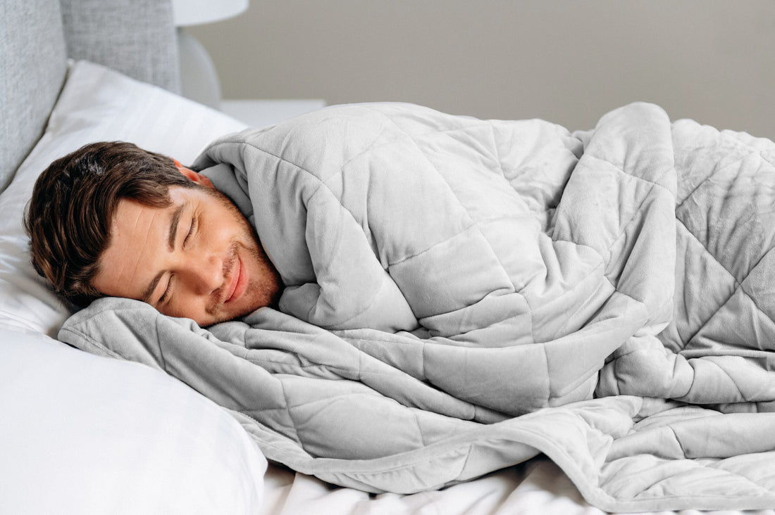 Man sleeping with a blanket